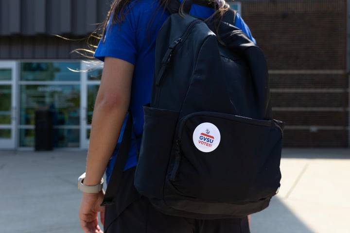 Black backpack wit GVSU Votes button